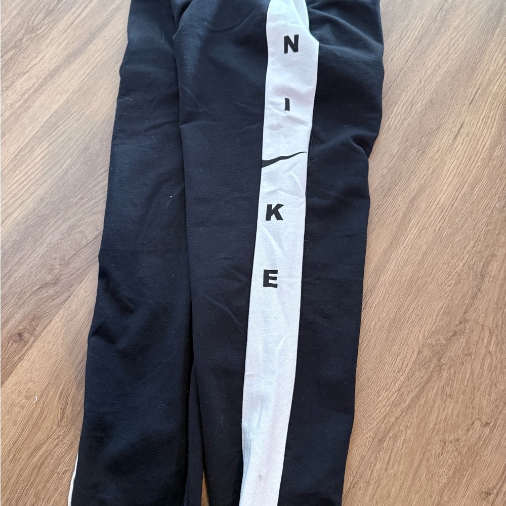 Nike Kids Black Joggers with White Stripe